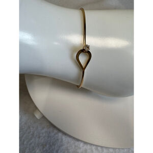 Women's vintage Avon Gold tone crystal delicate Bangle Bracelet